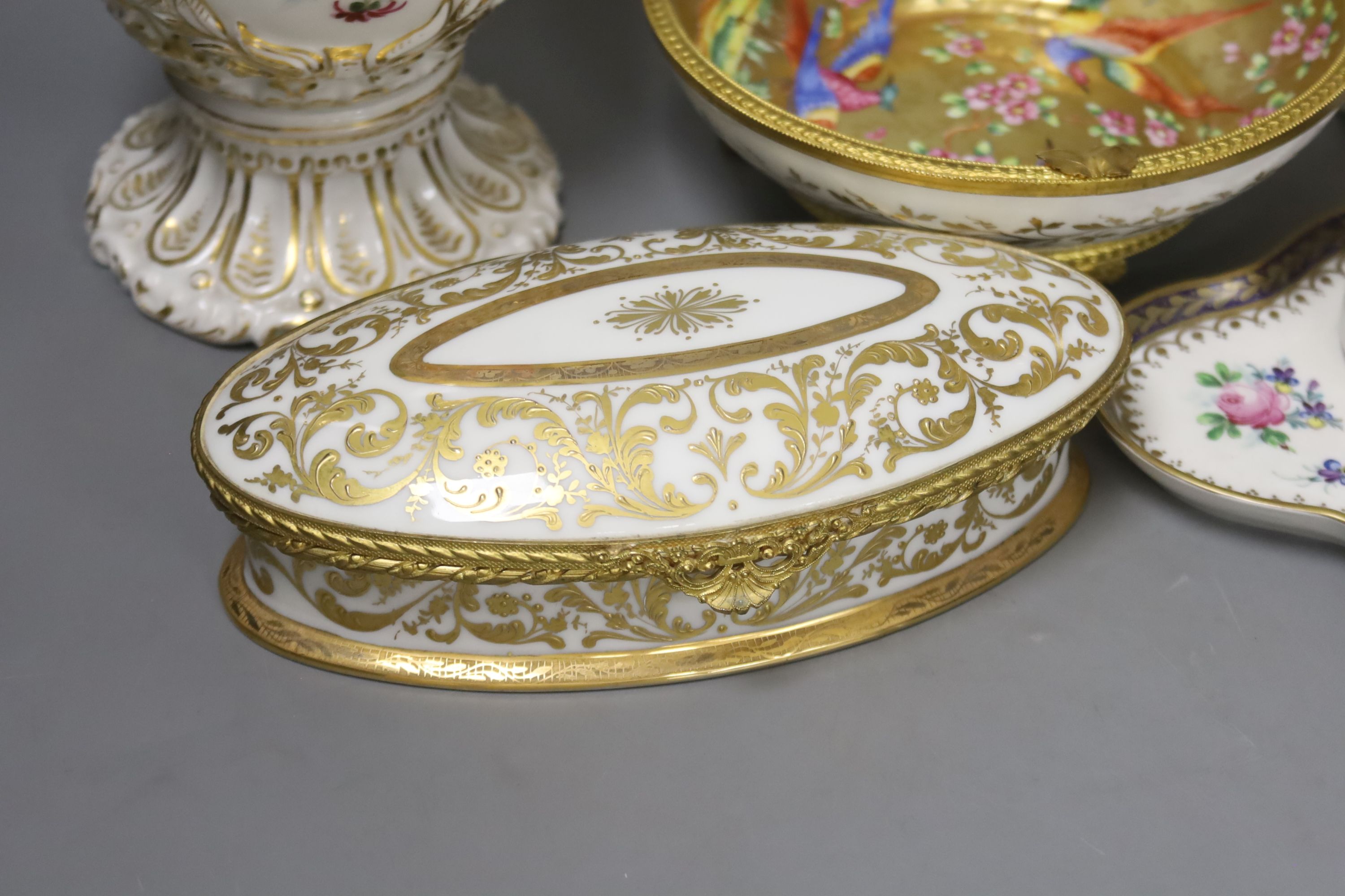 A Paris porcelain box and cover, c.1890, a pair Paris porcelain vases, a similar ‘fantastic birds’ bowl and a Dresden inkwell and height 25cm